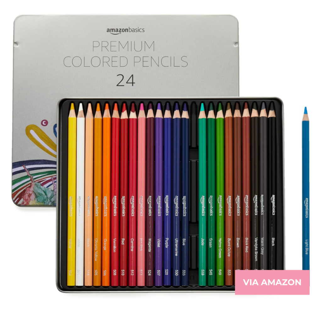 A set of 24 AmazonBasics premium colored pencils arranged in a metal tin. The pencils display various colors neatly organized in rows.