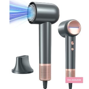 A modern gray and rose gold hair dryer with two buttons, shown front and side view, next to a detachable nozzle attachment.
