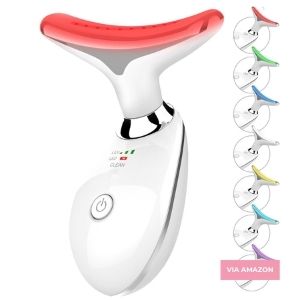 White handheld beauty device with a red LED light, power button, and multiple LED color options shown on the right side for different skincare modes.